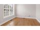 Bright room with hardwood flooring and natural light at 295 Langshire Dr, Mcdonough, GA 30253