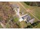 Stunning aerial view of a secluded home and property with a large outbuilding at 111 Ayers Driver Rd, Villa Rica, GA 30180