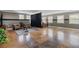 Open basement with distinct flooring and large windows providing ample natural light at 111 Ayers Driver Rd, Villa Rica, GA 30180