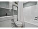 Cozy bathroom featuring a shower-tub combo, modern vanity, and neutral color palette at 111 Ayers Driver Rd, Villa Rica, GA 30180