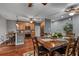 Cozy dining area adjacent to the kitchen, featuring a wood table and chairs at 111 Ayers Driver Rd, Villa Rica, GA 30180