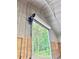 View of the roll-up door with the garage door motor, showing access to the interior at 111 Ayers Driver Rd, Villa Rica, GA 30180