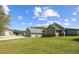 Spacious property with well-maintained landscaping, a modern home design, and convenient outbuildings and garages at 111 Ayers Driver Rd, Villa Rica, GA 30180