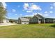 Exterior view displaying outbuildings, lawn, and gravel driveway at 111 Ayers Driver Rd, Villa Rica, GA 30180