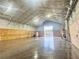 Bright interior featuring concrete floors, insulated ceiling, wooden paneling, and an open layout, ready for customization at 111 Ayers Driver Rd, Villa Rica, GA 30180