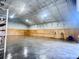 Large, clear interior features concrete floors, wooden paneling, an insulated ceiling, and an open layout at 111 Ayers Driver Rd, Villa Rica, GA 30180