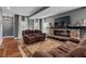 Comfortable living room with a stone fireplace, and hardwood floors at 111 Ayers Driver Rd, Villa Rica, GA 30180