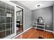 Open living space featuring wood-look floors, light neutral walls, and natural light at 111 Ayers Driver Rd, Villa Rica, GA 30180