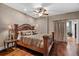 Comfortable main bedroom with a decorative bed frame and wood floors at 111 Ayers Driver Rd, Villa Rica, GA 30180