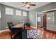 Home office with natural light, sliding glass doors, and a modern desk at 111 Ayers Driver Rd, Villa Rica, GA 30180