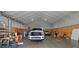 Bright outbuilding interior showcasing storage capacity and multiple vehicles at 111 Ayers Driver Rd, Villa Rica, GA 30180