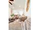 Comfortable living room area with a decorative mirror at 1166 Farmstead Rd, Suwanee, GA 30024