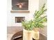 Cozy living room area with a fireplace and mounted TV at 1166 Farmstead Rd, Suwanee, GA 30024