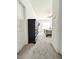 Spacious main bedroom with gray carpet, fan, and large window at 1166 Farmstead Rd, Suwanee, GA 30024