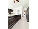 Main bedroom boasts a large bed, gray carpet, and walk-in closet at 1166 Farmstead Rd, Suwanee, GA 30024