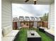 Outdoor living space featuring patio seating and a view of the neighborhood at 1166 Farmstead Rd, Suwanee, GA 30024