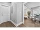 Open concept living space featuring dining area, sitting area and hard wood floors at 1716 Browning Sw St, Atlanta, GA 30314