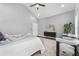 Main bedroom boasting modern decor, ceiling fan, high ceilings, and light from the windows at 1716 Browning Sw St, Atlanta, GA 30314