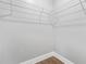 Spacious walk-in closet features wire shelving for ample storage and organization at 1716 Browning Sw St, Atlanta, GA 30314