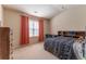 Spacious bedroom with neutral carpet, large window, and dresser at 2436 Sardis Chase Ct, Buford, GA 30519