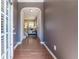 Elegant foyer with hardwood floors leading into a bright, open living space at 2436 Sardis Chase Ct, Buford, GA 30519