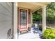 Inviting front porch with decorative accents, stone details, and a welcoming atmosphere at 2436 Sardis Chase Ct, Buford, GA 30519