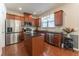 Modern kitchen with stainless steel appliances, granite countertops, and ample cabinet space at 2436 Sardis Chase Ct, Buford, GA 30519