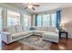 Spacious living room with hardwood floors, natural light, and stylish decor at 2436 Sardis Chase Ct, Buford, GA 30519