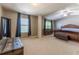 Spacious Primary bedroom with large windows, columns, and an ensuite bath access at 2436 Sardis Chase Ct, Buford, GA 30519