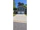 Charming exterior showcasing a two-story home with a spacious driveway and well-maintained facade at 440 Sheppard Xing Ct, Stone Mountain, GA 30083