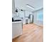Bright kitchen with white cabinets, stainless steel appliances, and modern finishes at 440 Sheppard Xing Ct, Stone Mountain, GA 30083