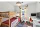 bedroom featuring a bunk bed and desk at 1240 Birchwood Ln, Roswell, GA 30076