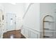 Clean entryway with hardwood floors, stairway to second floor, and simple decor at 1240 Birchwood Ln, Roswell, GA 30076