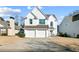 Charming two-story home with a well-manicured lawn, two car garage, and inviting curb appeal at 1240 Birchwood Ln, Roswell, GA 30076