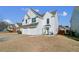 Charming two-story home with a well-manicured lawn, two car garage, and a welcoming entrance at 1240 Birchwood Ln, Roswell, GA 30076