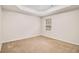 Simple bedroom with neutral walls, carpeted flooring and a window for ample natural light at 2036 Broadmoor Way, Fairburn, GA 30213