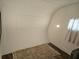 Small bedroom with a neutral rug, window with curtains, and white walls at 5440 Portside Dr, Acworth, GA 30101