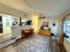 Cozy dining area adjacent to kitchen, featuring modern lighting and neutral decor at 5440 Portside Dr, Acworth, GA 30101