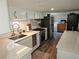 Well-equipped kitchen featuring granite counters, stainless steel appliances and ample cabinet space at 5440 Portside Dr, Acworth, GA 30101