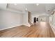 Spacious basement featuring hardwood flooring, recessed lighting, and a staircase at 1662 Hartford Ne Gln, Atlanta, GA 30319