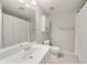 Bathroom featuring a sink vanity, mirror, and a shower with white curtain at 1662 Hartford Ne Gln, Atlanta, GA 30319