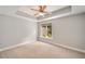 Bedroom with a ceiling fan, natural light, carpet flooring and neutral paint at 1662 Hartford Ne Gln, Atlanta, GA 30319
