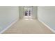 Empty bedroom with neutral walls, carpet, and a bright window view at 1662 Hartford Ne Gln, Atlanta, GA 30319