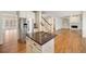 Gourmet kitchen featuring a center island, stainless steel appliances, and an open floor plan at 1662 Hartford Ne Gln, Atlanta, GA 30319