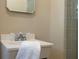 Tight shot of bathroom with shower and white vanity and sink at 2972 Ponderosa Cir, Decatur, GA 30033