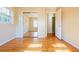 Bedroom with hardwood floors and view into mirrored closet at 2972 Ponderosa Cir, Decatur, GA 30033