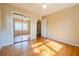 Bedroom with hardwood floors, ceiling fan, and large mirrored closet at 2972 Ponderosa Cir, Decatur, GA 30033
