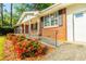Traditional brick home featuring red azaleas and well-maintained landscaping at 2972 Ponderosa Cir, Decatur, GA 30033