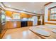 Eat-in kitchen with breakfast nook, laminate floors, wood cabinets, and black appliances at 2972 Ponderosa Cir, Decatur, GA 30033