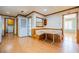 Eat-in kitchen with breakfast nook, laminate floors, and white appliances at 2972 Ponderosa Cir, Decatur, GA 30033